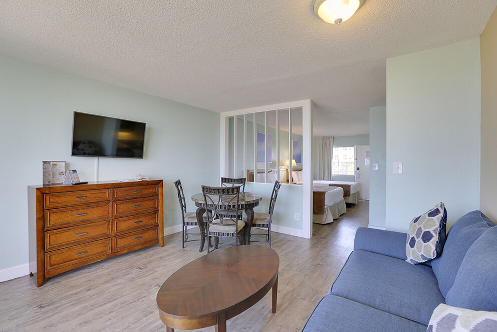 a living room with a couch and table