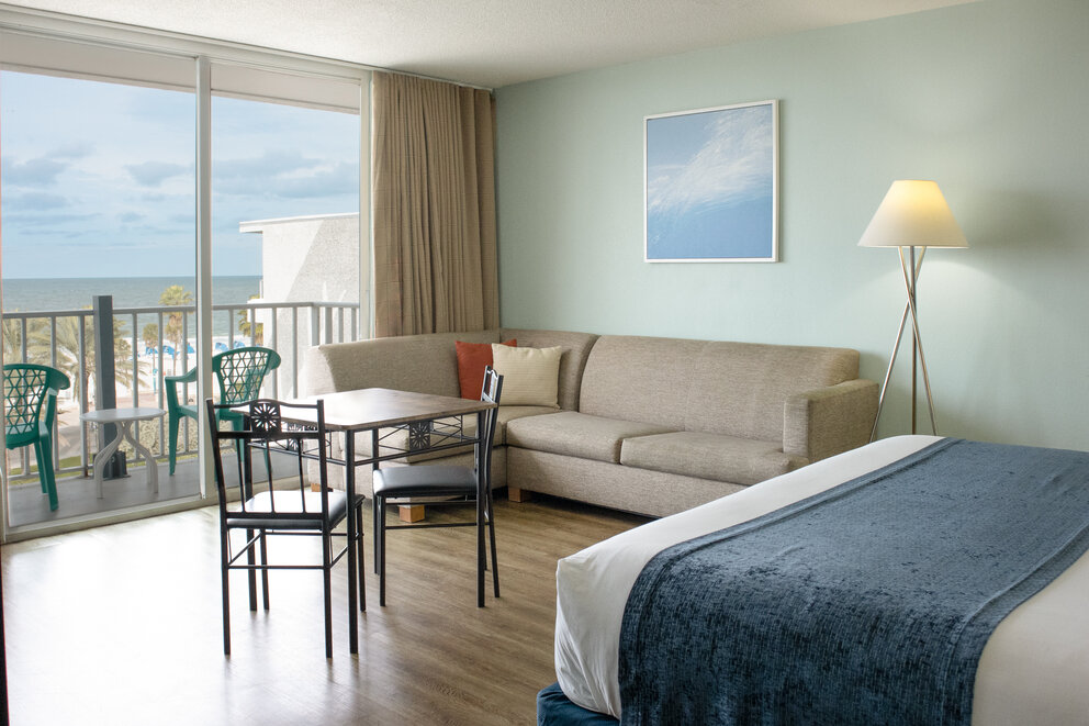 a room with a bed and a couch